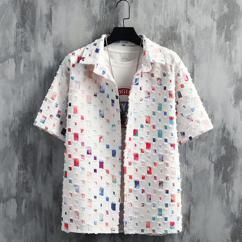 Close-up of men's vibrant spectrum leisure set, showcasing frayed hems and soft fabric.
