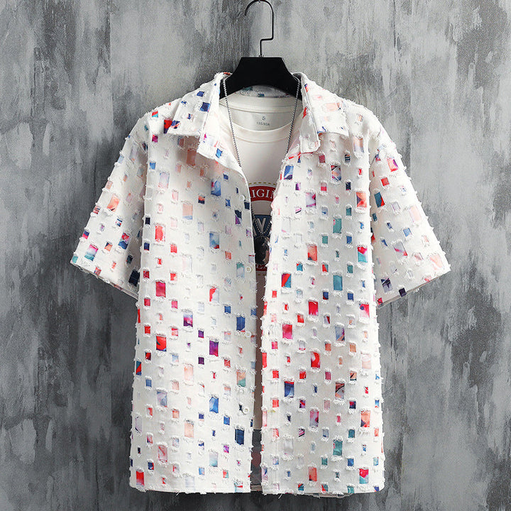 Close-up of men's vibrant spectrum leisure set, showcasing frayed hems and soft fabric.