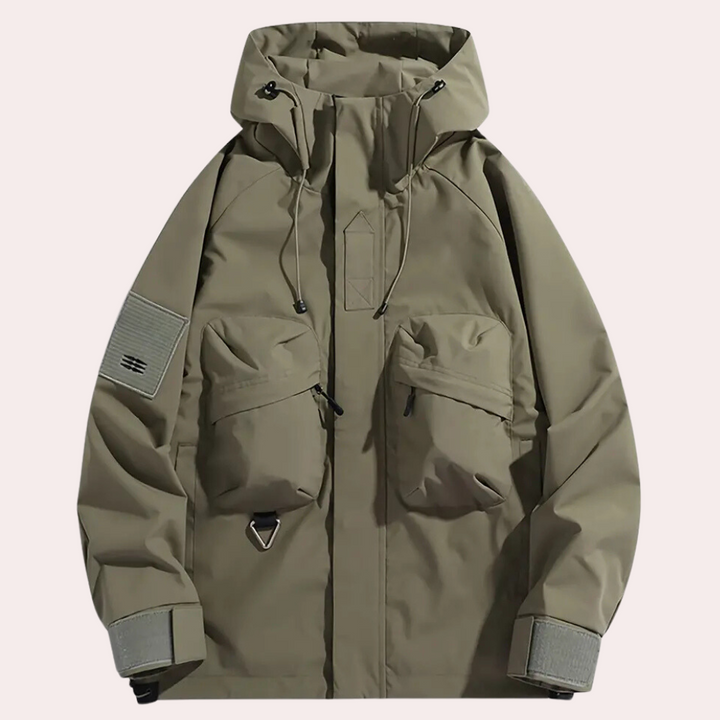 Men's Victor hooded windbreaker. This lightweight, water-resistant jacket is ideal for athletic & casual outdoor wear.