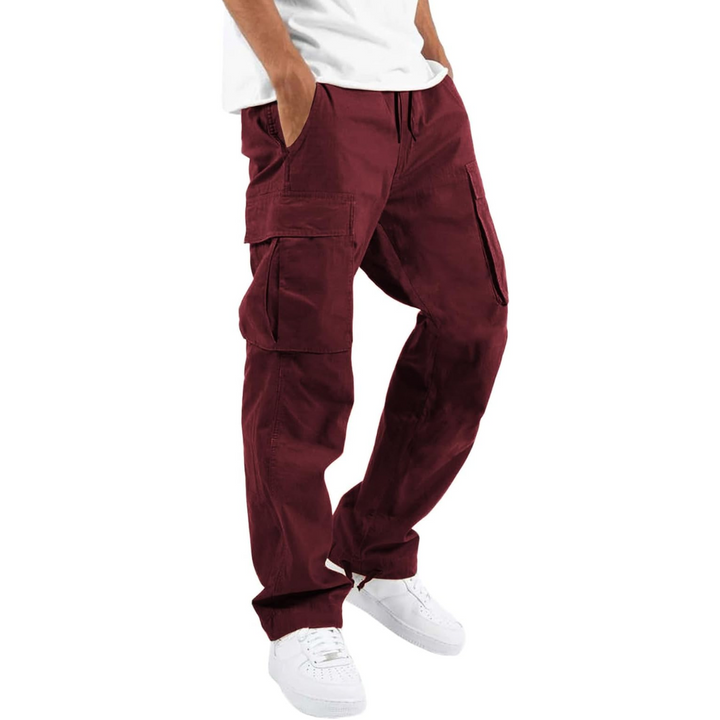 Pair of Vincent men's cotton cargo joggers, folded neatly, showing fabric texture.