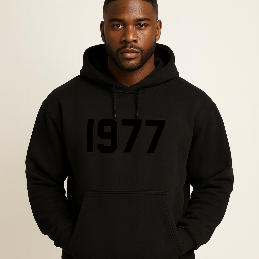 Detail shot of the 1977 print on a men's vintage "Chase" raglan sleeve streetwear hoodie.
