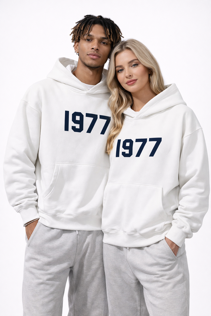 Back view of a men's 1977 vintage "Chase" hoodie, featuring raglan sleeves for a retro look.