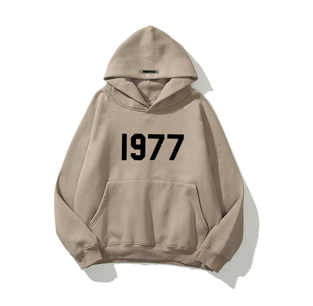 Cozy men's pullover hoodie, 1977 vintage print, raglan sleeves. Perfect casual streetwear for winter.