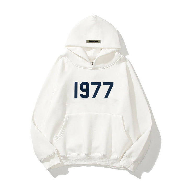 Comfortable men's raglan sleeve hoodie featuring a bold 1977 vintage streetwear print. Pullover style.