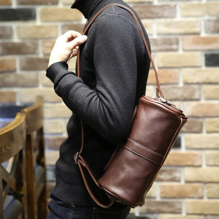 Versatile men's vintage barrel shoulder bag. PU leather, great for shoulder or crossbody daily use.