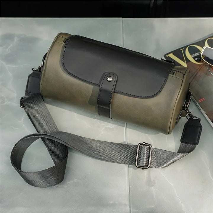 Classic men's vintage style PU leather barrel bag. Functional shoulder & crossbody for modern men.