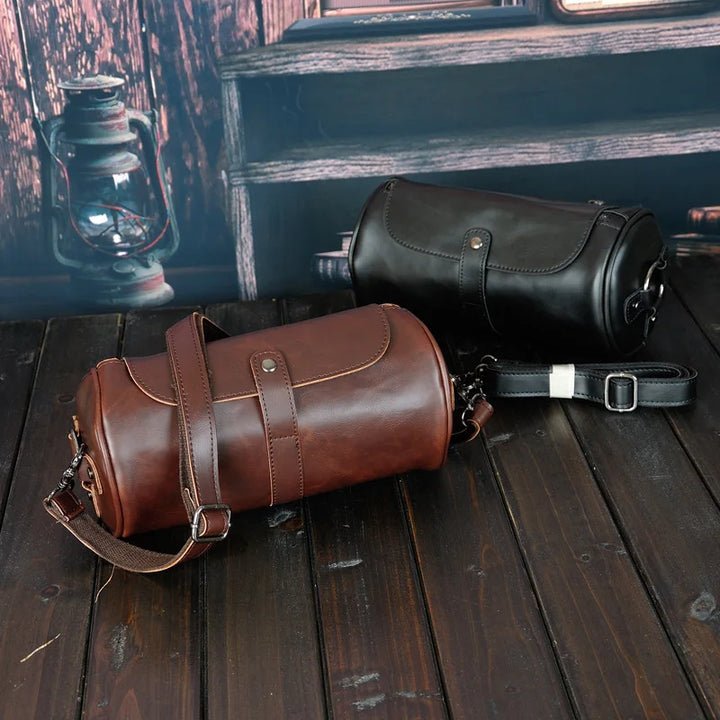 Men's fashion vintage PU leather barrel shoulder bag. A stylish accessory for daily essentials.