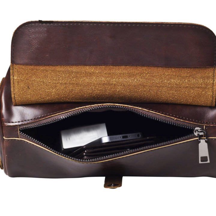 Vintage PU leather men's barrel shoulder bag, ideal for storing daily essentials, adds a stylish touch.