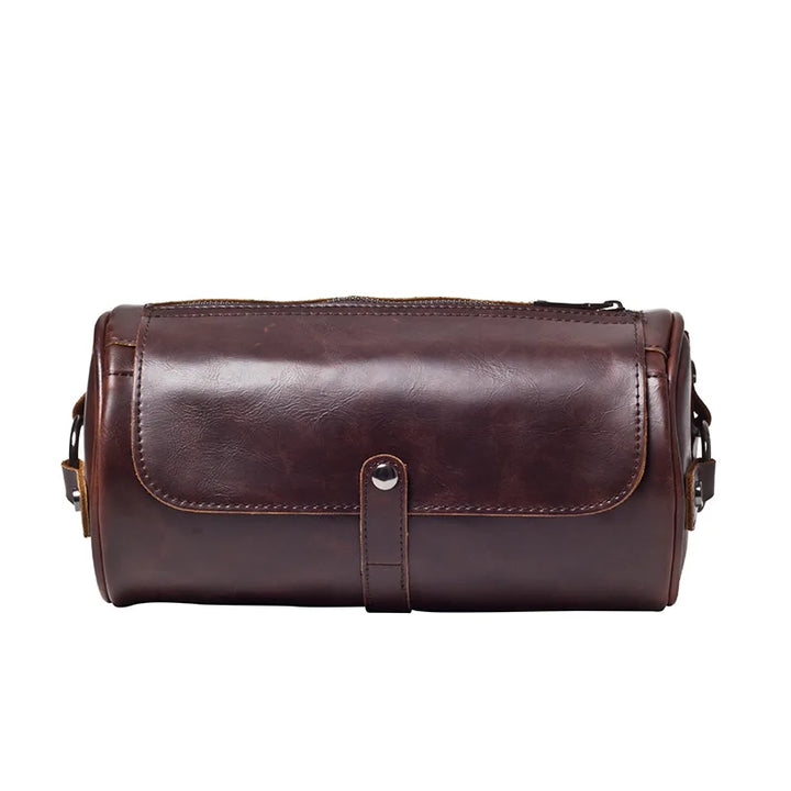 Carry daily essentials in this vintage men's PU leather barrel shoulder bag. Perfect crossbody.