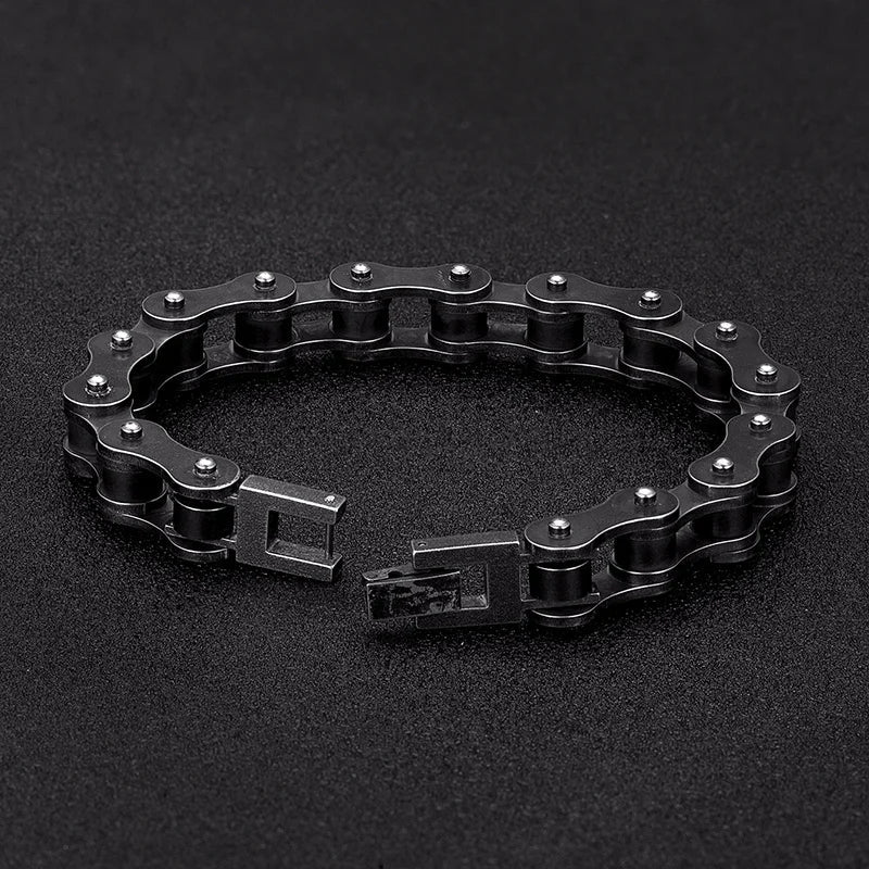Adjustable men's vintage black chain bracelet worn on a wrist, a masculine stainless steel gift for him.