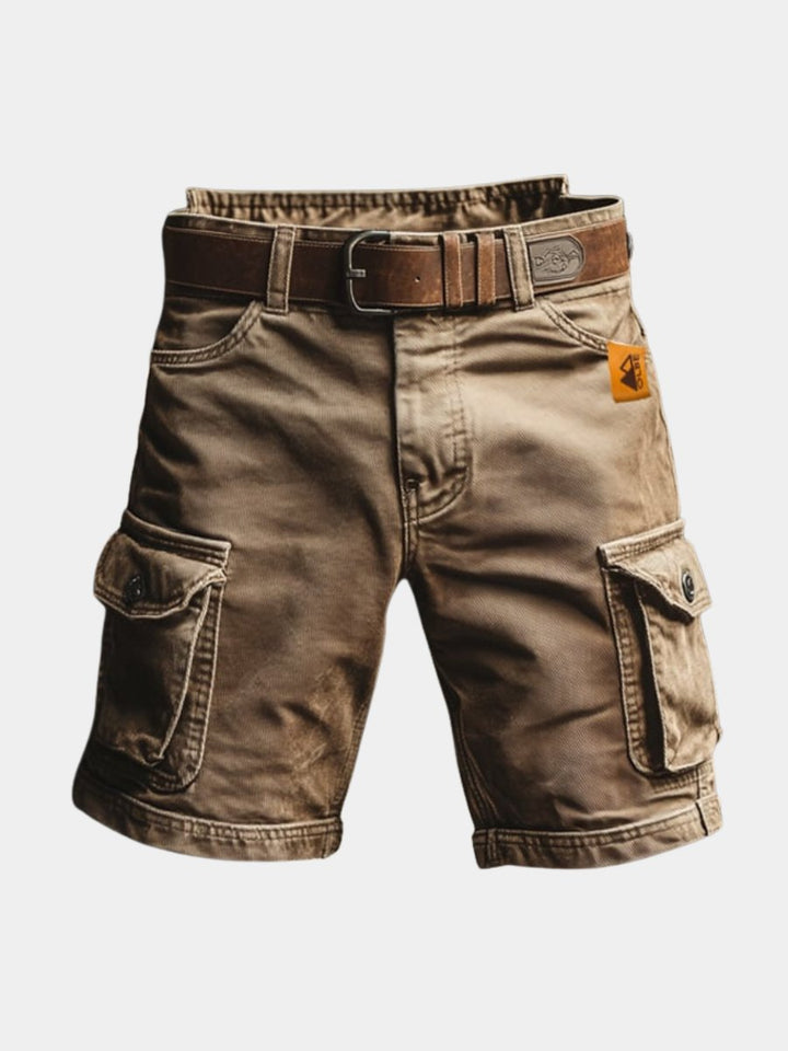Men's vintage cargo shorts in rugged style with multiple utility pockets for outdoor adventures.