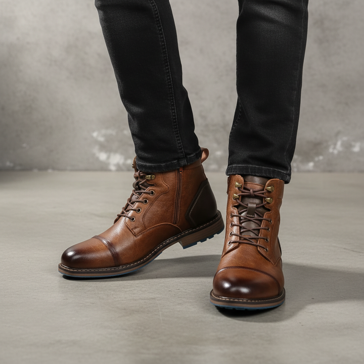 Men's vintage inspired leather ankle boots, brown with classic stitching for a stylish look.