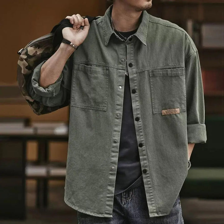 Retro men's long sleeve snap button-up shirt. Casual vintage style cotton blend for a relaxed fit.
