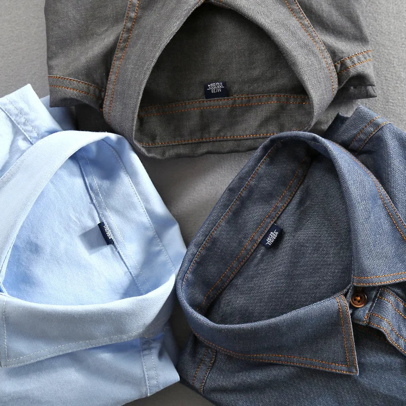 Gray men's vintage fashion polo shirt, short sleeve, dual chest pockets for urban style.