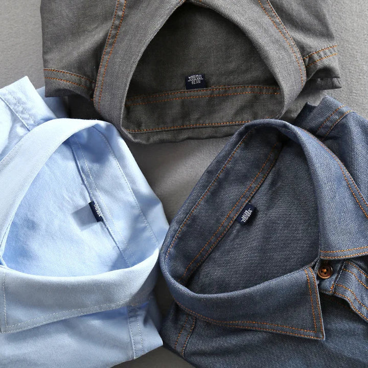 Gray men's vintage fashion polo shirt, short sleeve, dual chest pockets for urban style.