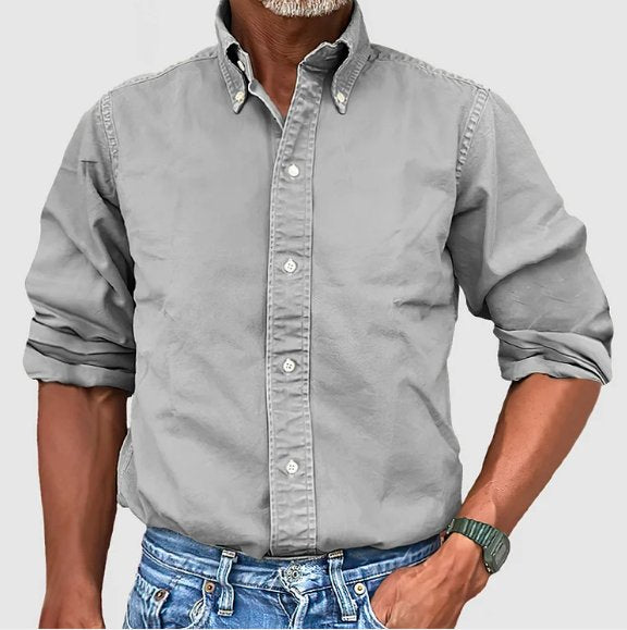 Men's vintage wash collared button-down shirt. Long sleeve, relaxed fit. Classic, versatile, comfortable.