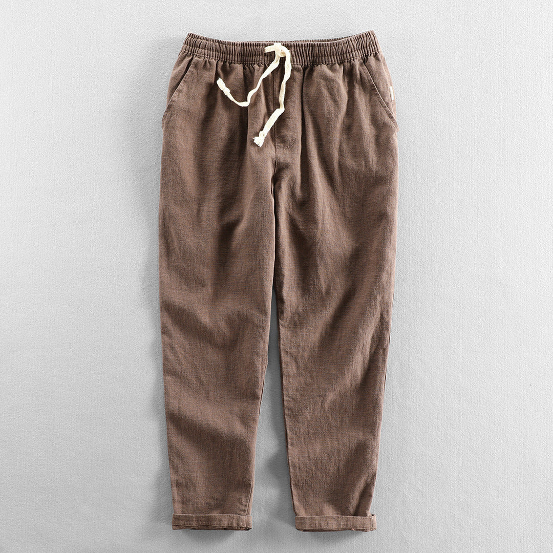 Breathable men's linen trousers, perfect for summer vacation and warm weather comfort.