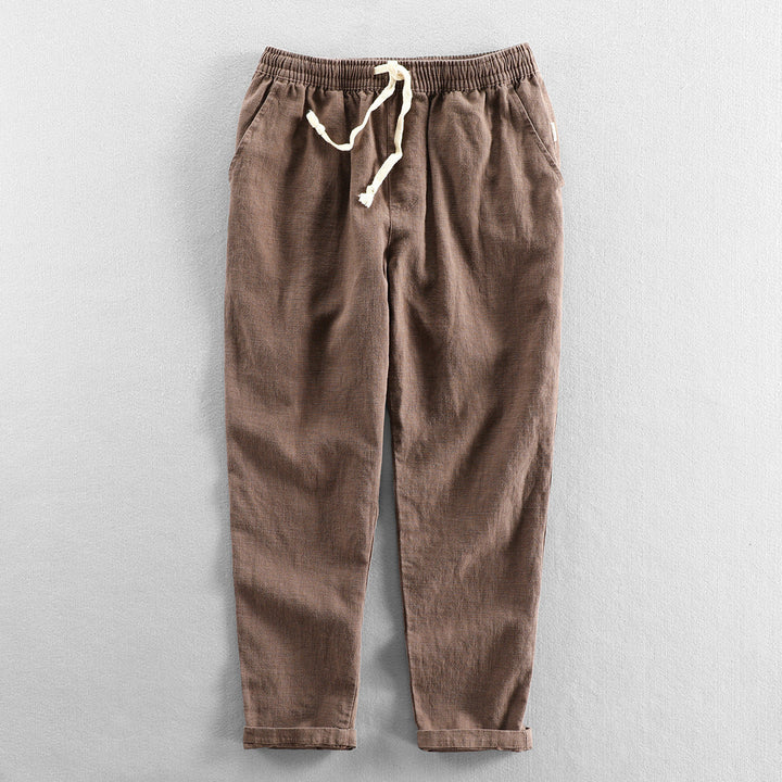 Breathable men's linen trousers, perfect for summer vacation and warm weather comfort.