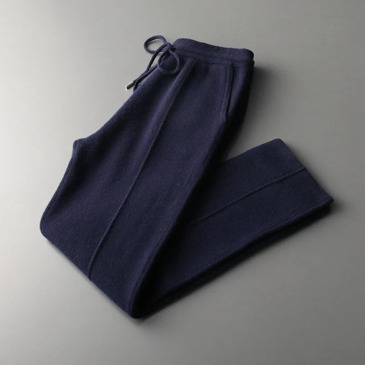 Men's Voco tailored trousers worn by model, showcasing comfortable smart casual styling for everyday elegance.