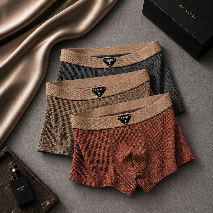 Soft men's waffle knit boxer shorts, perfect for comfortable home wear & stretch loungewear undergarment.