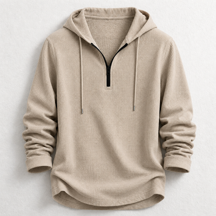 Casual men's long sleeve waffle knit hooded henley shirt with quarter zip, made from comfortable cotton.