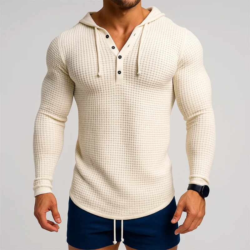 Close-up of men's waffle knit hoodie showing breathable fabric texture. Ideal for layering & all-season comfort.