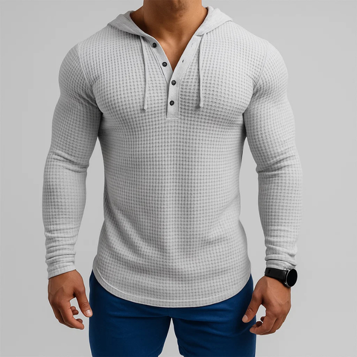 Stylish men's waffle knit hoodie, a versatile hooded sweatshirt for a layered look or casual everyday wear.