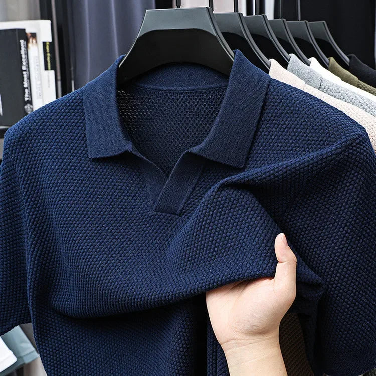 Tailored men's waffle knit polo shirt, durable and versatile everyday wear.