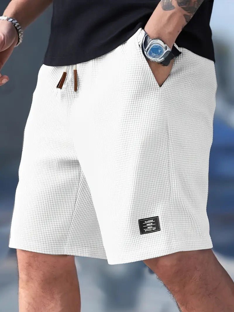 Essential men's waffle knit shorts, relaxed fit, providing ultimate comfort & casual style for summer fashion.
