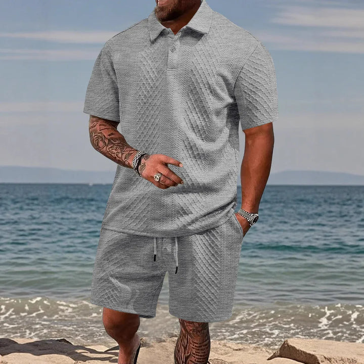 Versatile men's waffle summer outfit. Breathable polo & shorts set for casual or active use.