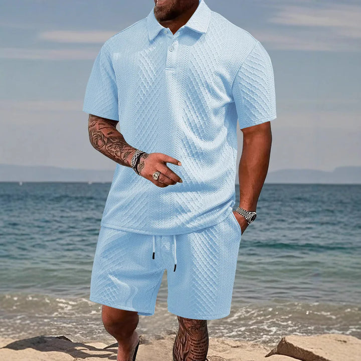 Trendy men's summer co-ord set. Waffle polo & shorts for stylish casual apparel. Breathable fabric.