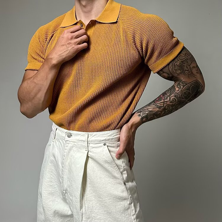 Back view of a men's waffle texture polo shirt. Clean design for versatile fashion.