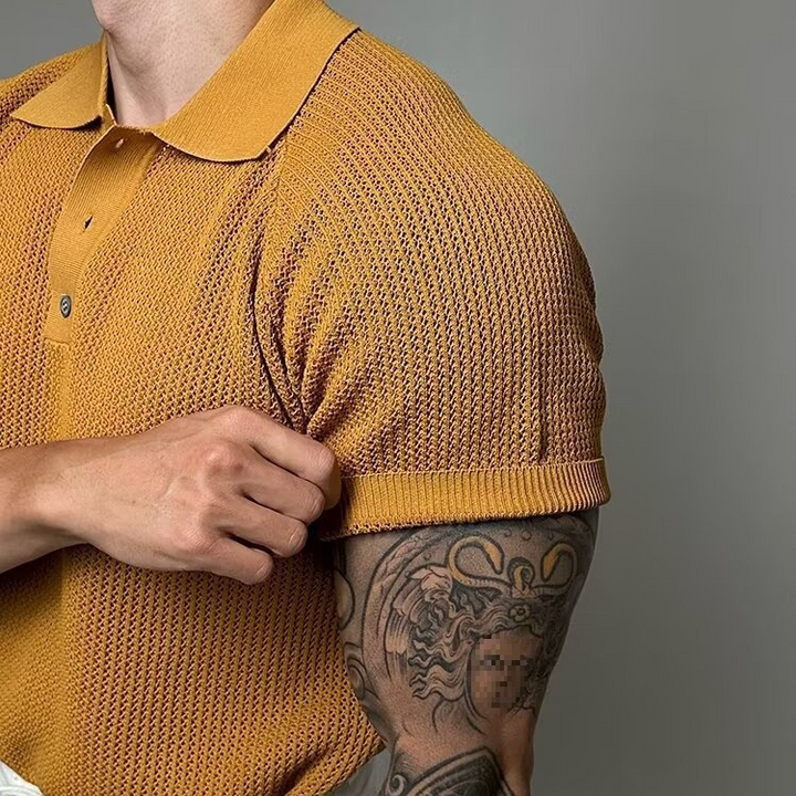 Close-up: men's waffle texture, breathable short sleeve polo for everyday versatile style.