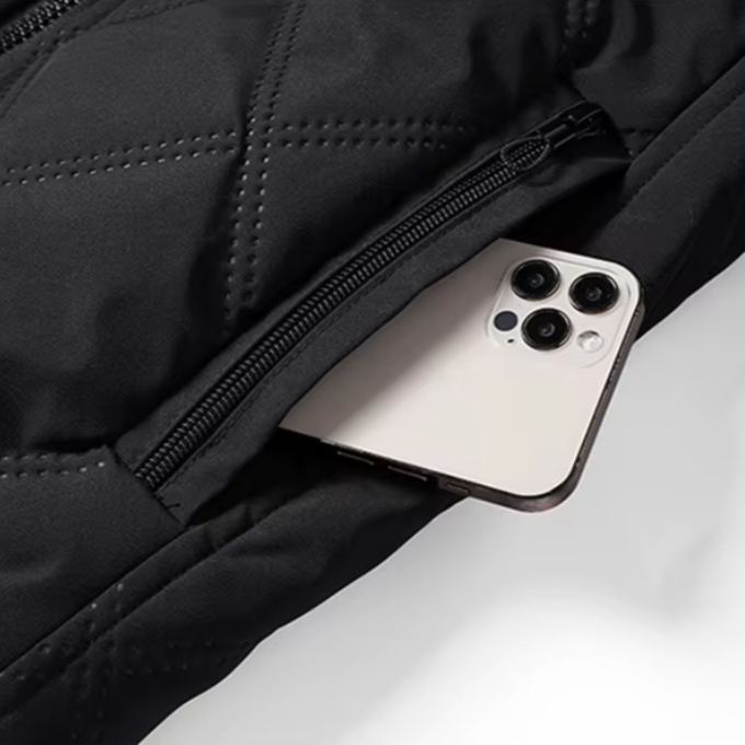 Heavy-duty men's Alpine Guard winter jacket, protective & warm for extreme cold conditions.