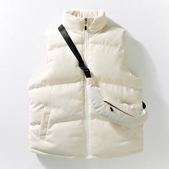 Men's warm alpine vest, a modern sleeveless jacket with an attached crossbody bag. Essential men's winter clothing.