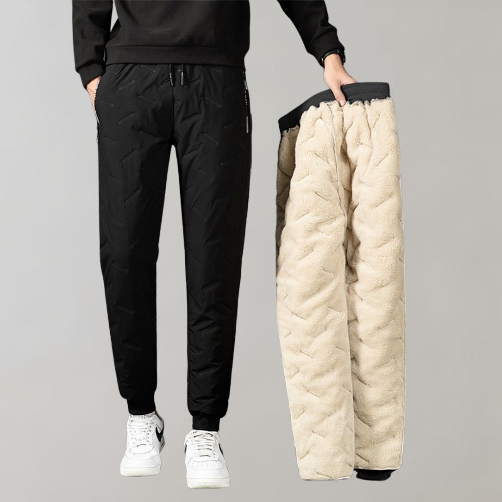 Slim fit gray men's winter pants with tapered leg, ideal for casual and durable outdoor use.
