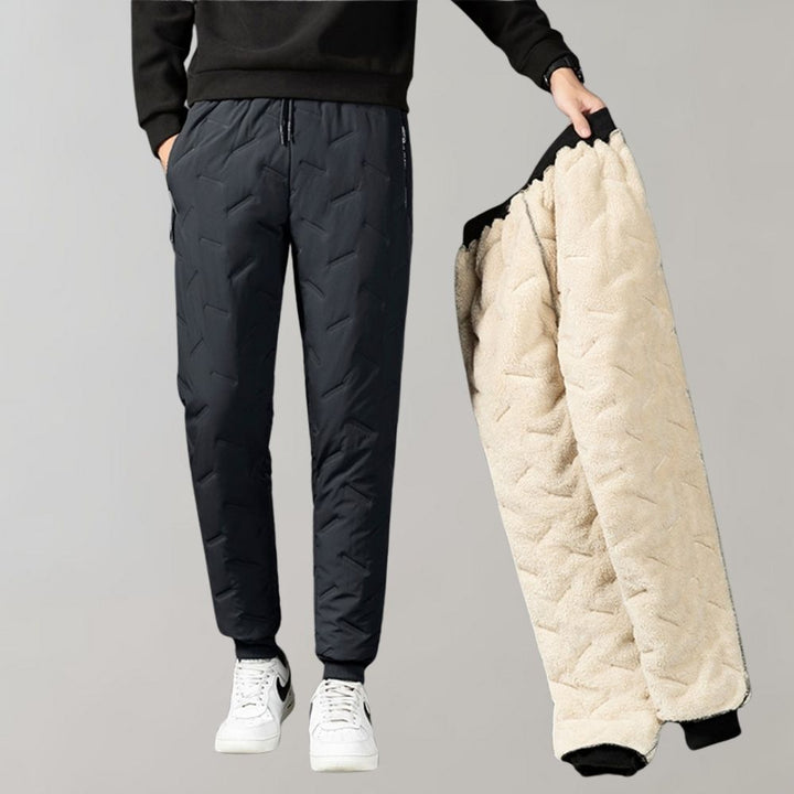 Warm tapered leg men's pants in gray, comfortable for winter casual wear and outdoor activities.