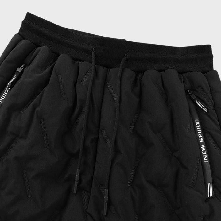 Durable black men's winter apparel, comfortable and warm for cold weather outdoor use.