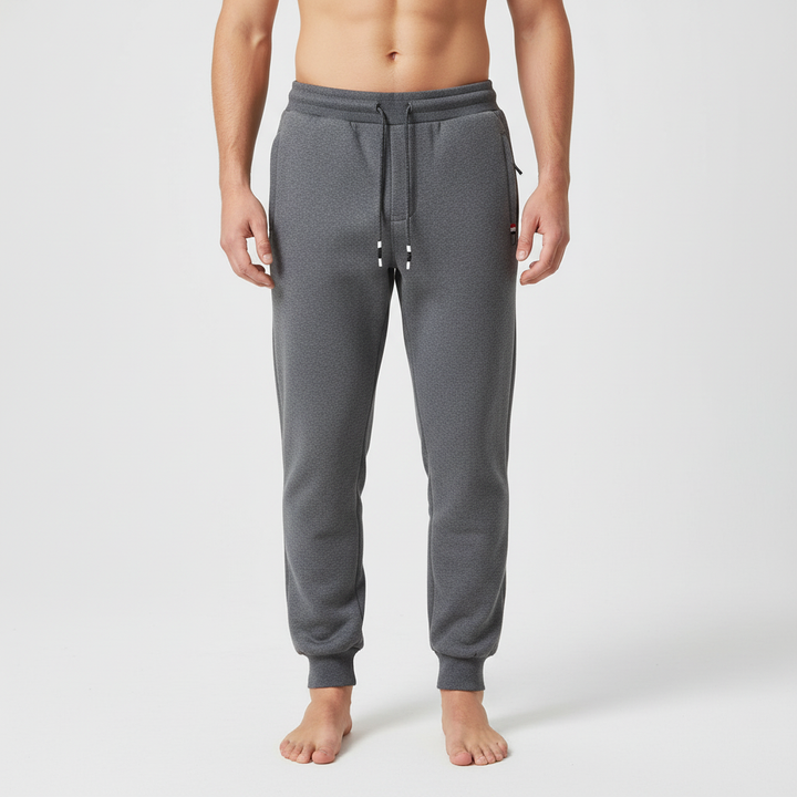Collection of men's fleece lined joggers in various colors, perfect for winter comfort and loungewear