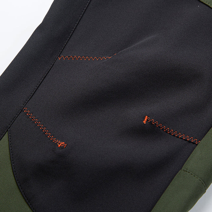 Men's functional winter pants, insulated for warmth, ideal for active outdoor adventures.