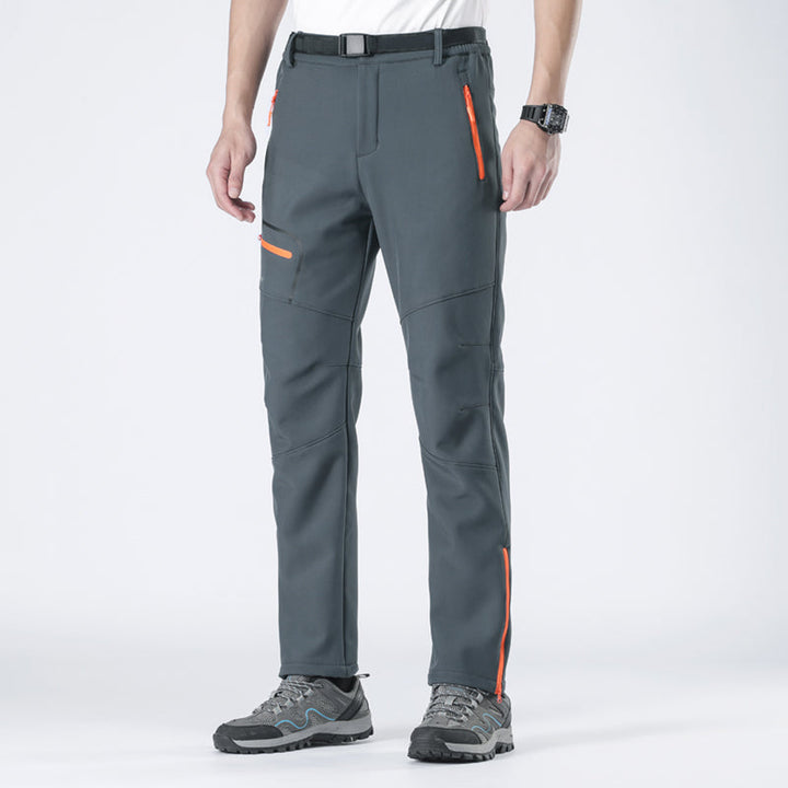Versatile men's cold weather pants, waterproof & warm, perfect for travel & outdoor sports.