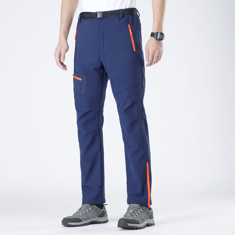 Stylish men's insulated winter pants, designed for comfort and warmth in outdoor settings.