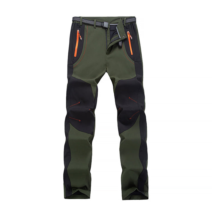 Men's travel-friendly insulated winter pants, perfect for cold weather expeditions.