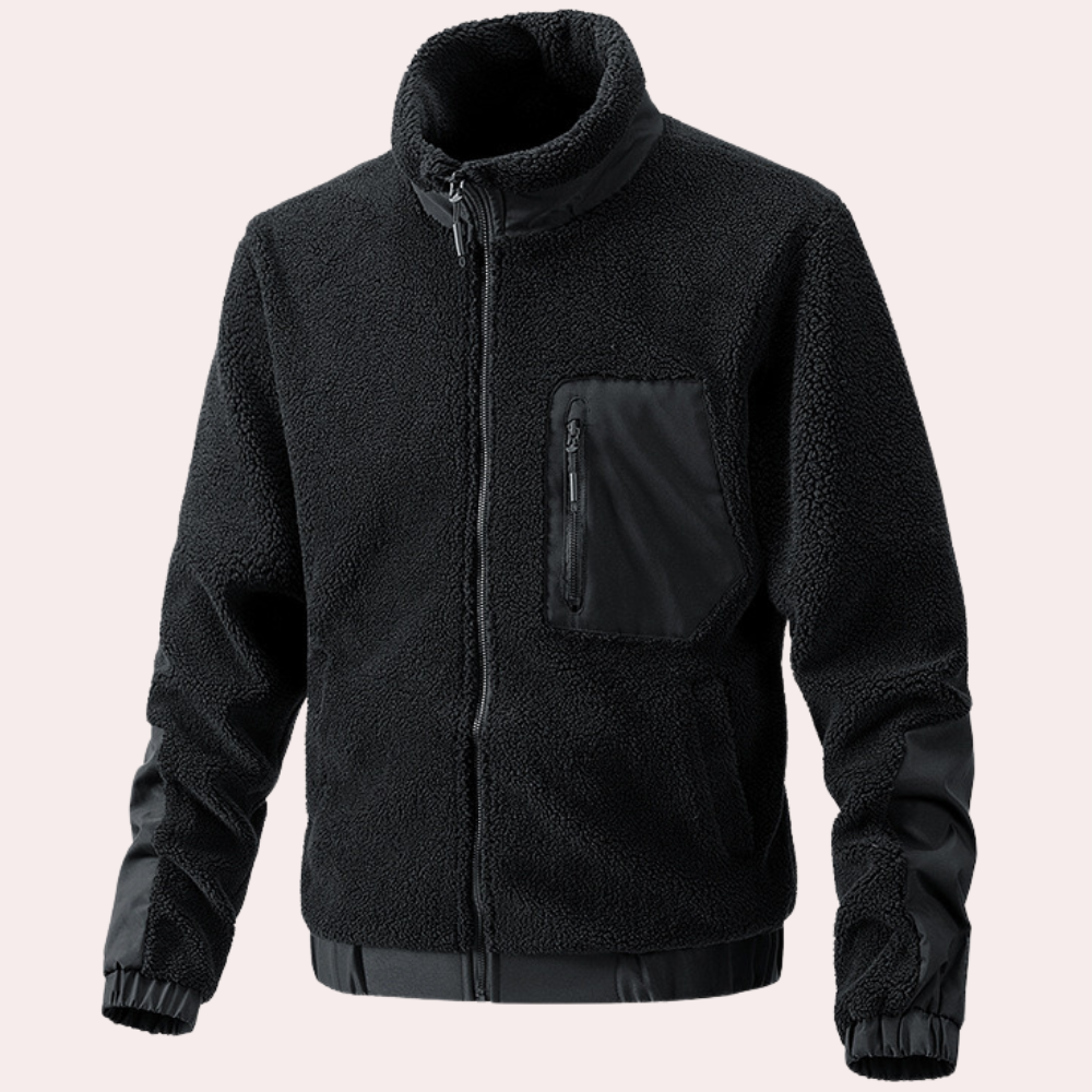 Close-up of durable fabric & secure zipper on a warm men's outdoor jacket. Ultimate cold weather comfort.