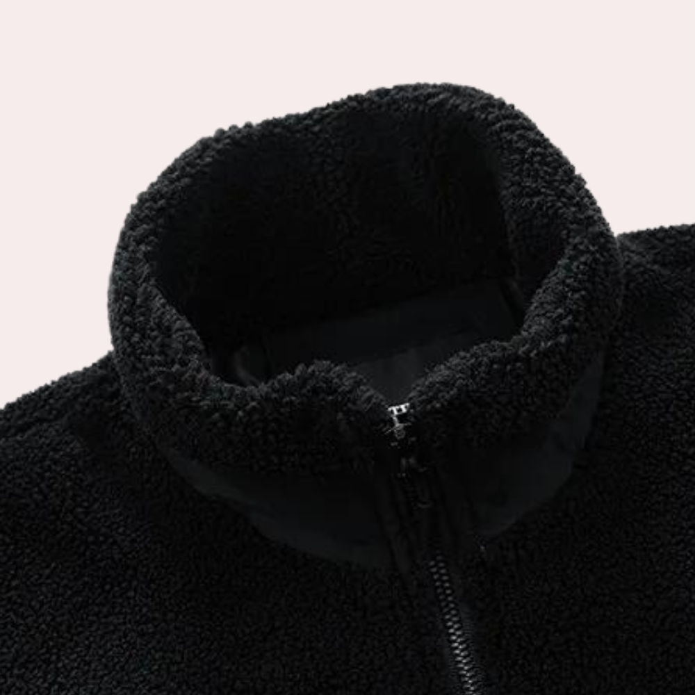 Men's warm blue outdoor jacket for cold weather. Versatile fall/winter coat offering comfort & style.