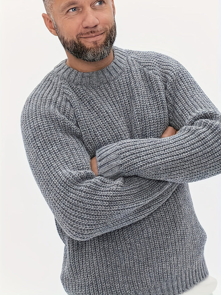 Men's warm knit winter sweater. Solid color, long sleeve for cozy comfort. Perfect for cool weather fashion.