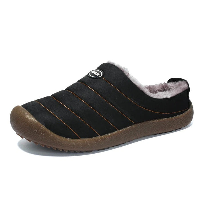 Men's cozy winter footwear, warm lined slip-on slippers for maximum comfort.
