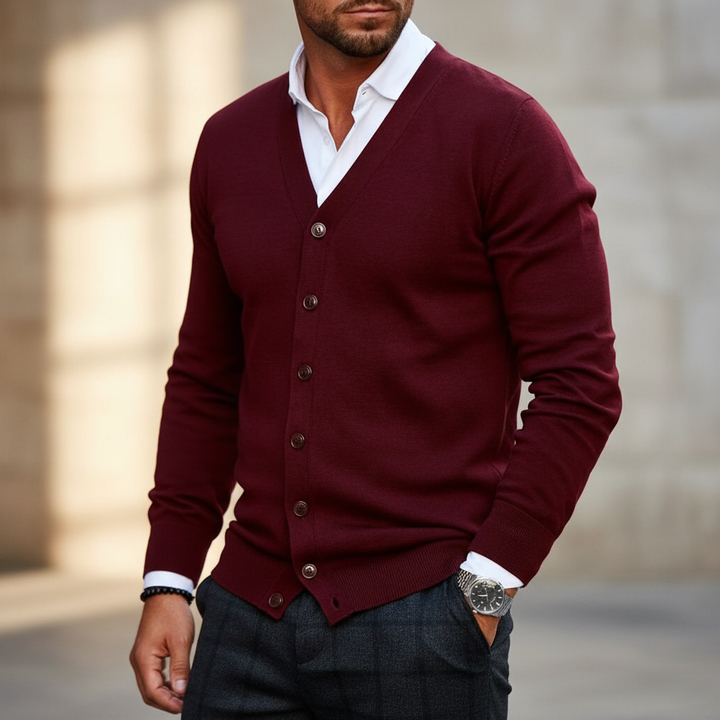 Men's warm navy knit cardigan with button-front closure, perfect for elegant layered winter fashion.