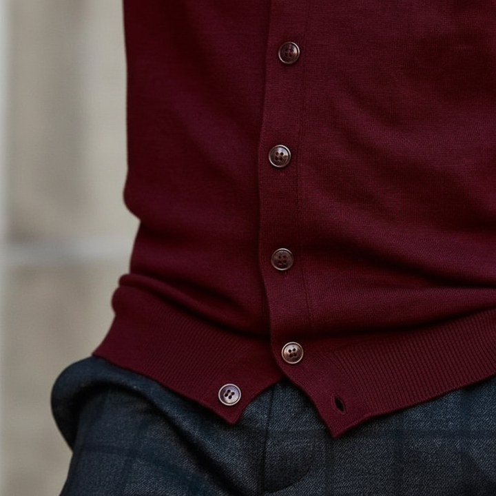 Man wearing a comfortable black button-front knit cardigan, ideal for casual and warm winter outfits.
