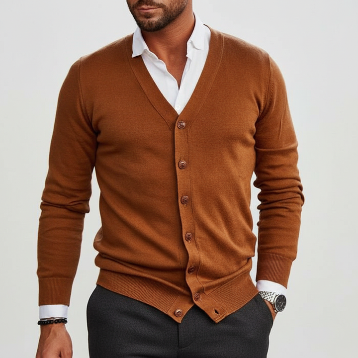 Folded green men's warm knit cardigan, showcasing its soft texture and button-front detail for comfort.